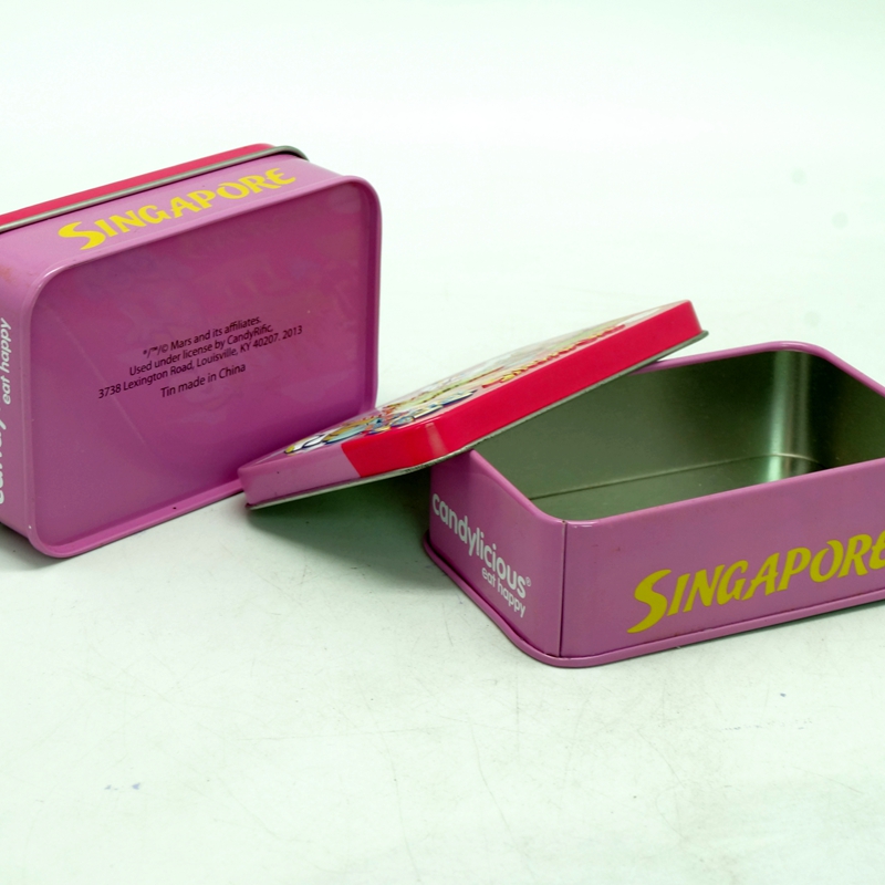 Small embossed tin can for sweet with cartoon design