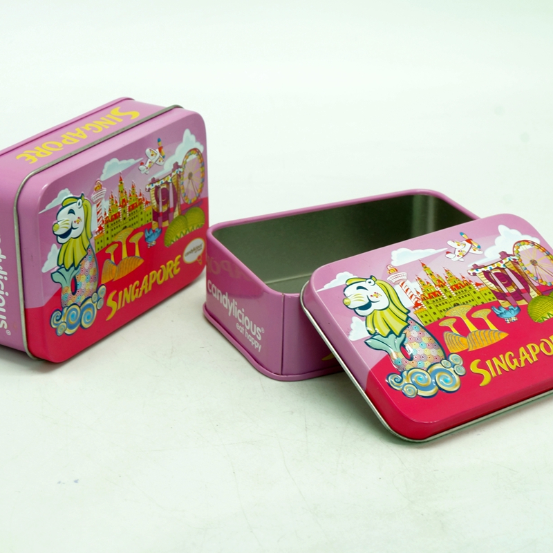 Small embossed tin can for sweet with cartoon design