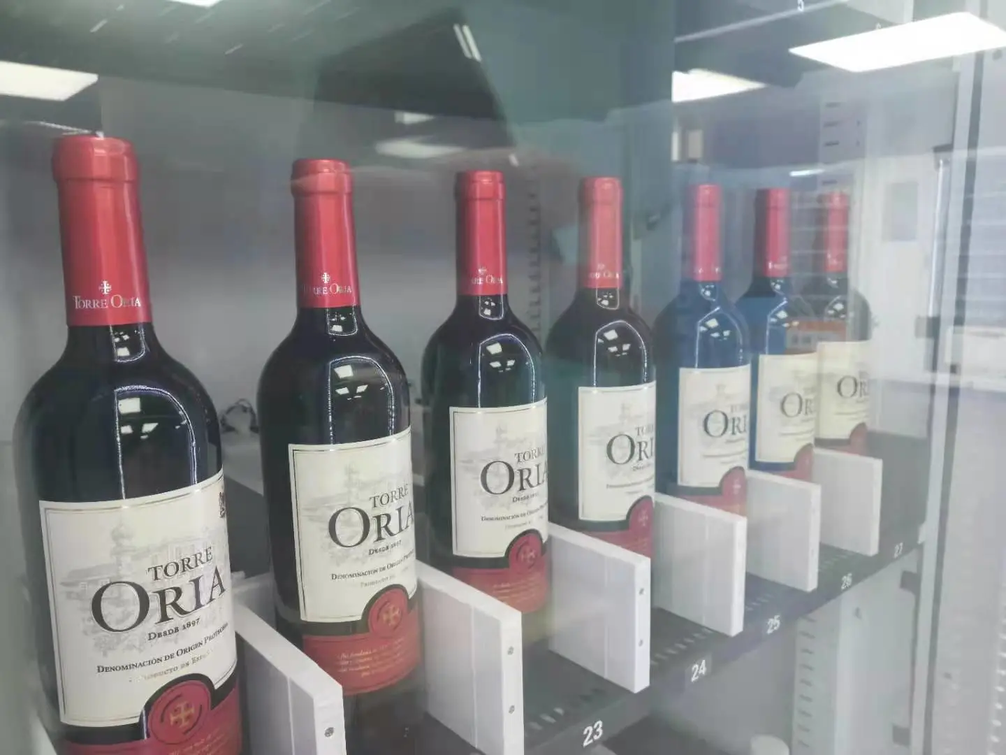 wine glass bottle beer vending machine elevator lift
